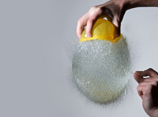 Illustration for article titled High-speed photographs capture water balloons the moment after they pop